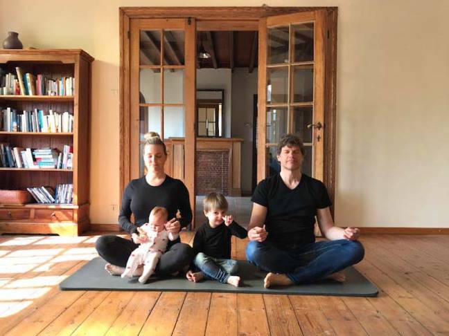Steven Laureys with his wife and two of his children meditating during confinement. 