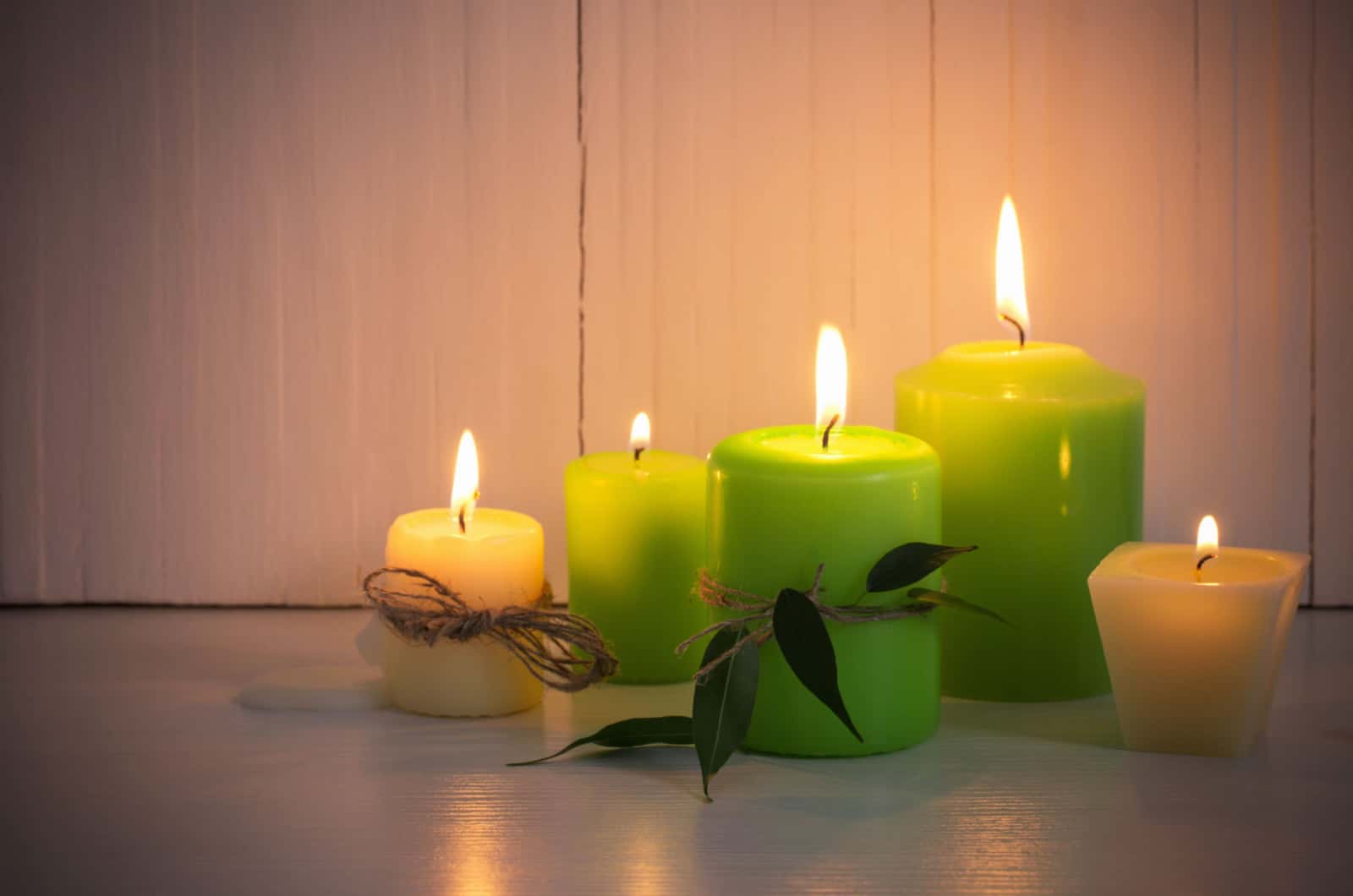lit green candles