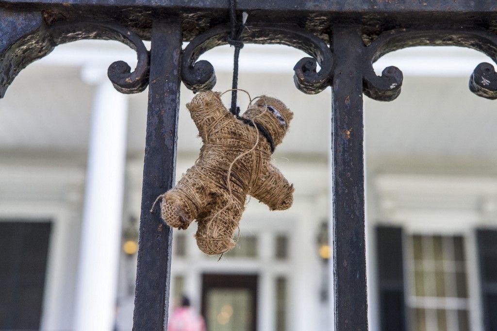 A voodoo doll attached to the front door of a home on Oct. 11, 2014, in New Orleans, Louisiana.