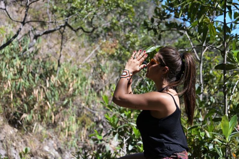 Carol Cianni teaches the technique of mindfulness meditation at the spiritual center, Paradise of the Pandavas, in the natural reserve of Chapada dos Veadeiros, state of Goias, Brazil, on June 17, 2022 (AFP - EVARISTO SA)