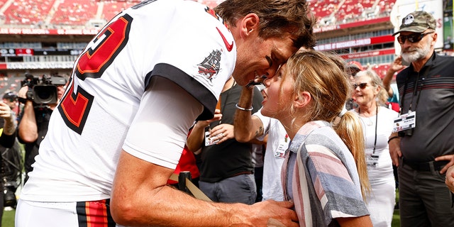 Tom Brady stopped by to greet his family before his football match, but his wife, Gisele, was conspicuously absent.