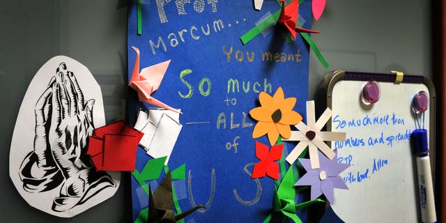 Memories and notes of affection and loss are posted on the office door of American University business professor Sue Ann Marcum, who was killed in an apparent home invasion at her Bethesda home, in Maryland on October 26, 2010.