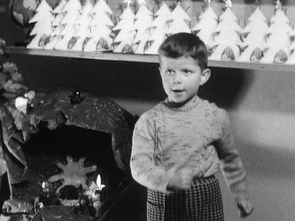 Little boy singing a Christmas song in 1960. [RTS]