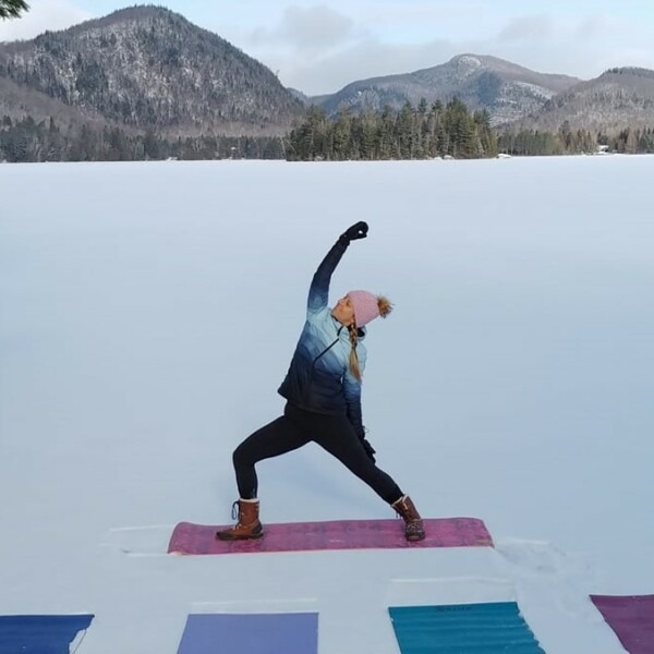 Participate in a free yoga on snow session!